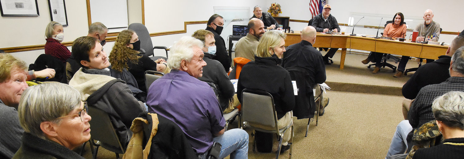 Owensville’s administrator and elected officials look on with State Parks and DNR  officials along with local landowners Nancy and John Paul Quick smile at a comment (left) made by  State Rep. Bruce Sassmann. Officials from the Belle community are also shown in attendance.
