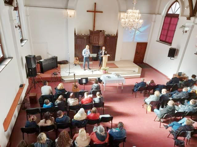 Chris Cook preaches at a church in Elk, Poland. There were Polish and Ukrainians in the service. Cook’s preaching was interpreted into Polish and then Ukrainian.  Almost all Polish churches are adjusting to accommodate Ukrainian refugees in worship.