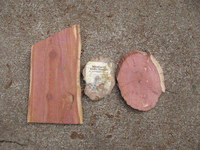 With no kiln drying, this cedar came from logs that have been dead for  more than 70 years.  The center plaque is a sample of the ones Walnut Hollow Farms got from us in the 70’s. They sold a huge number of these.