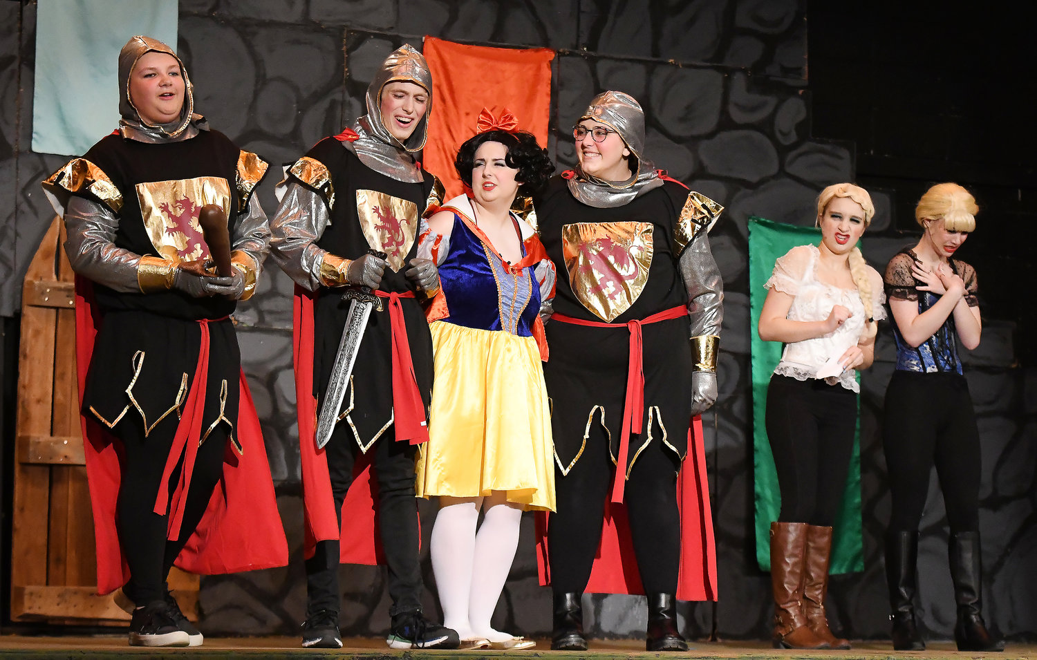 Lauren Shields, as Snow White, is detained by the guards.