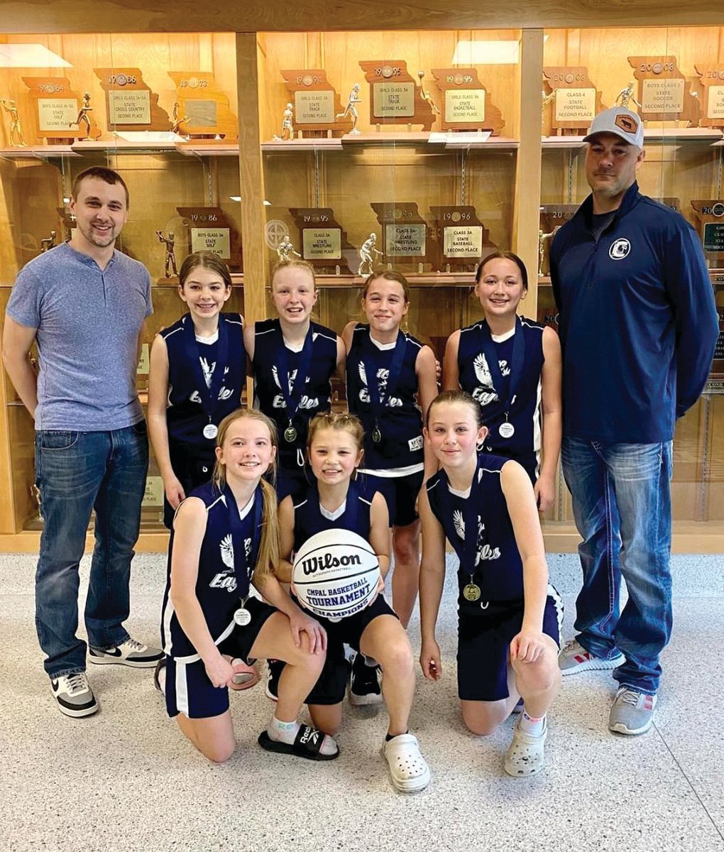 The Immaculate Conception-LC fifth-grade Lady Eagles (Loose Creek/Westphalia) won the Catholic Bowl. Team members are, from left to right, front row, Chloe Voss, Lexi Massman, Gracie Atkins; and in the back row, Coach Brenton Voss, Kamryn Haslag, Lyla Riegel, Rilynn Wieberg, Camille Dickneite, and Coach Sean Haslag.