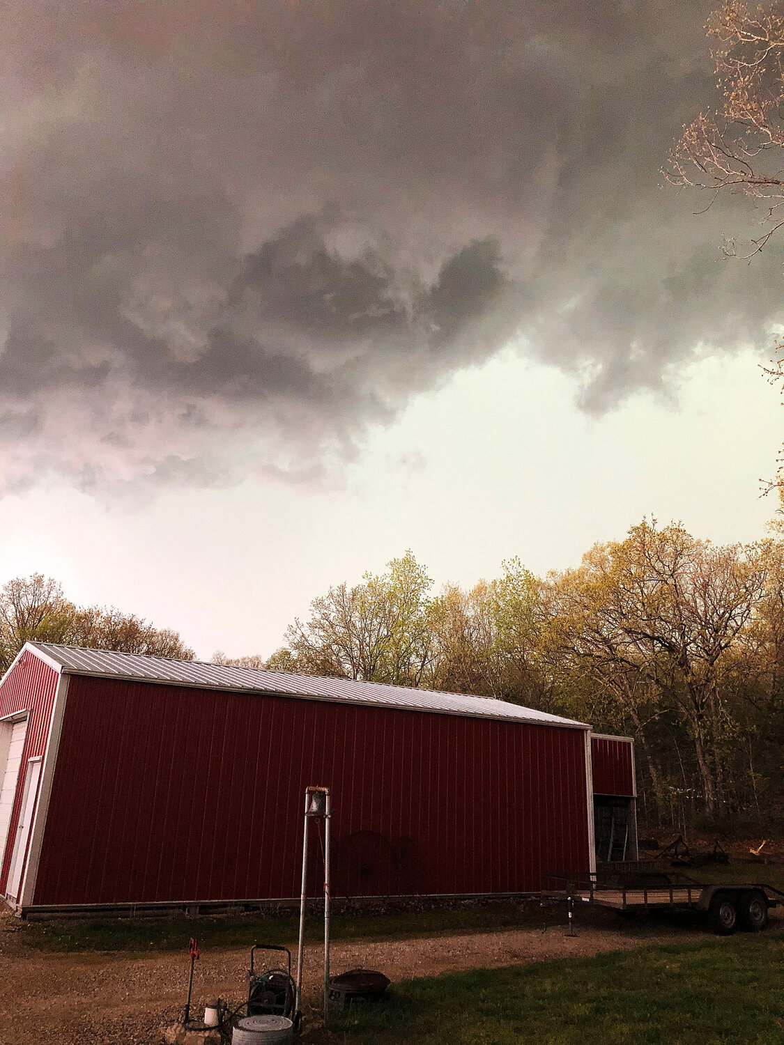 Threatening clouds pass over the southern Gasconade County residence of Terry and Tammy Havelka. Hail soon covered their yard.