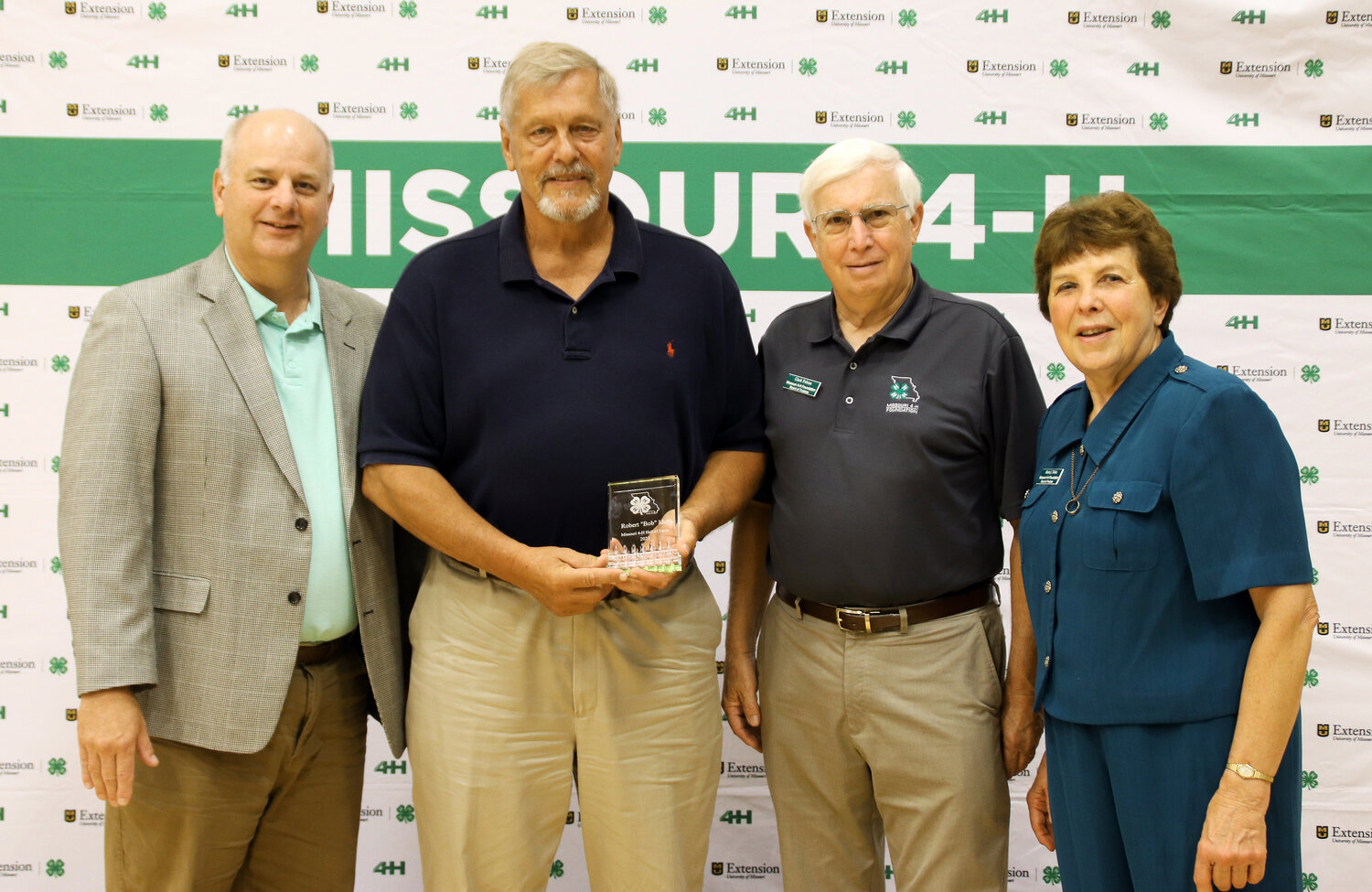 Missouri 4-h Hall of Fame inductee Bob “Chuck” Idel (second from left) is pictured with 4-H Foundation trustees (from left) Earl Niemeyer, Clark Fobian, and Marla Tobin.